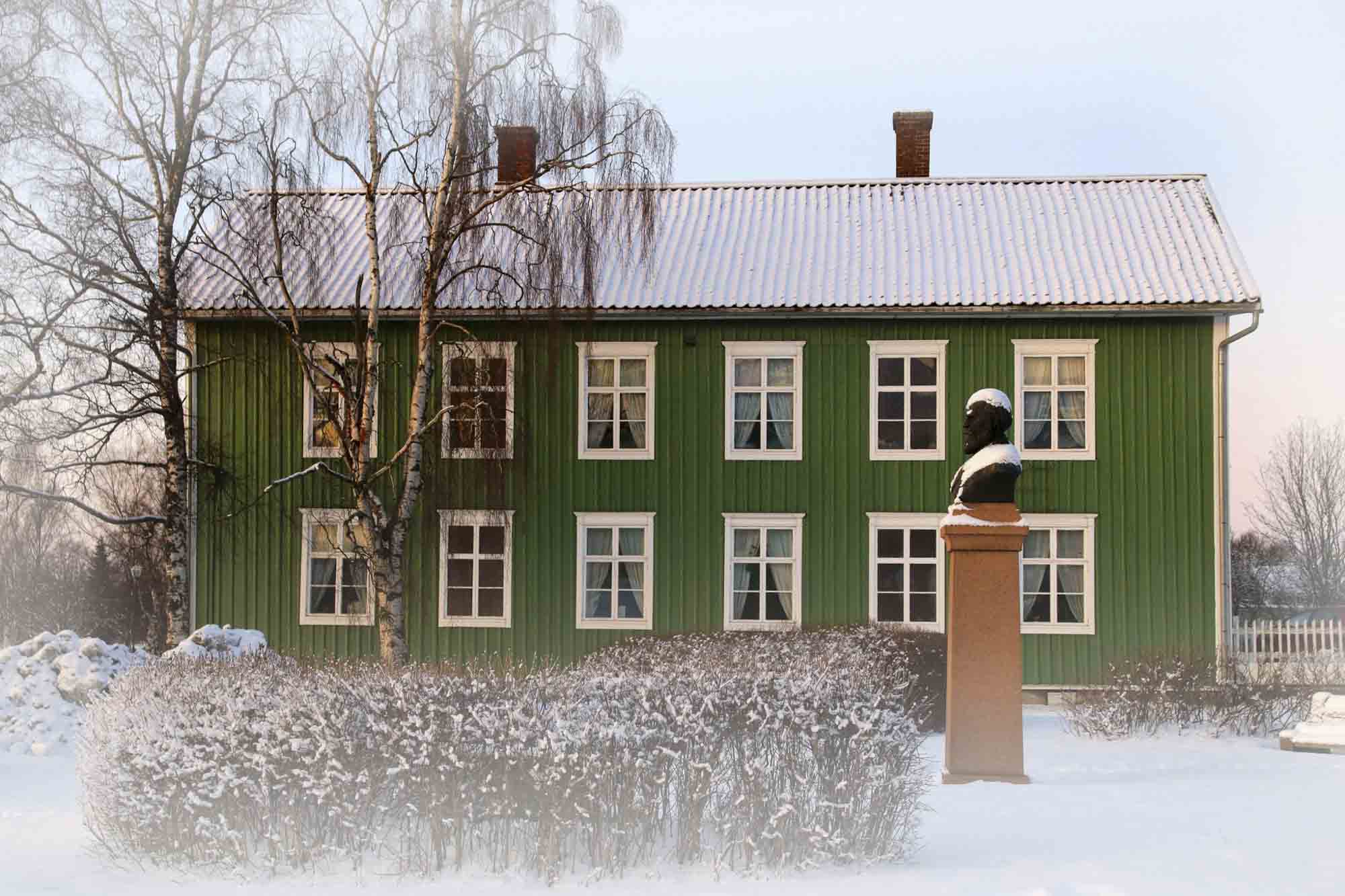 Historic wooden house in winter